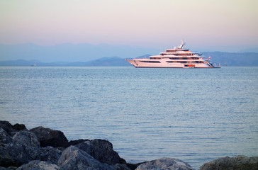 Big ship sailing during sunset