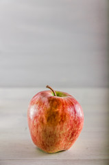 fresh red apple on a white background with copy space