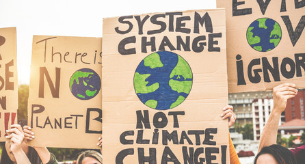 Group of demonstrators on road, young people from different culture and race fight for climate...