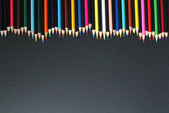 pencils on black background