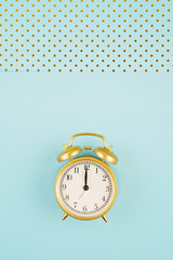 Flat lay with vintage alarm clock