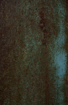 Heterogeneous texture of blue rusted metal