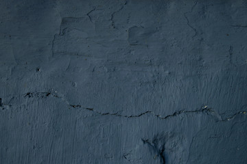 Gray texture wall cracks in different places