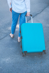the man with the bright suitcase. the trip into a vacation.