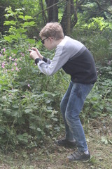 Young boy using a camera