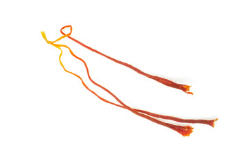 Group of three whole bright dry shaffron thread flatlay isolated on white background