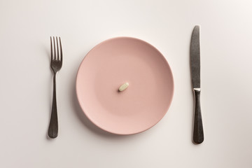 Pill on a plate. Flat lay.