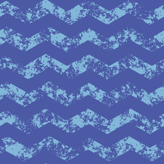 A seamless vector pattern with grunge blue chevron. Surface print design.