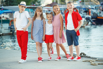 Fashionable children by the sea. Children's fashion. 