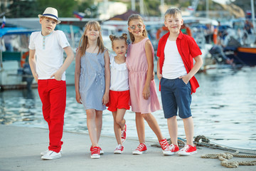 Fashionable children by the sea. Children's fashion. 