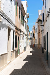 Fototapeta na wymiar Streets of old city in Menorca Balearic Island Spain