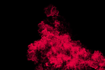 abstract colored dust explosion on a black background.abstract powder splatted background.