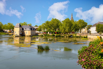 Fototapeta na wymiar La Flèche. Le Loir et le moulin des quatre saisons. Sarthe. Pays de la Loire