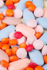 multicolored pills, healthcare and medicine