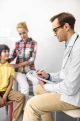 Therapist having appointment with family stock photo