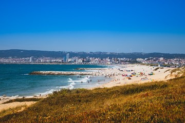 Figueira da foz beach Portugal. Summer day in Europe. Boho style coloured style photo.  Over processed.