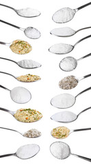 set from steel spoons with various salts isolated