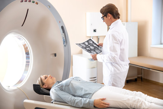 Doctor analyzing results of computed tomography test