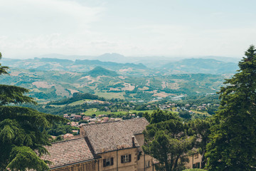 Fototapeta na wymiar San Marino cityscape. Italy landmark. Italian hills view from above. 