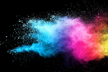 Explosion of colored powder isolated on black background. Abstract colored background. holi festival.