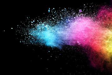 Explosion of colored powder isolated on black background. Abstract colored background. holi festival.