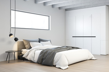 Corner of white master bedroom with wardrobe