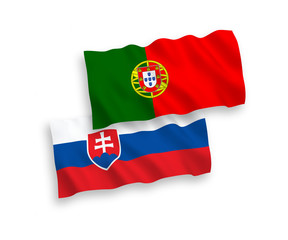 National vector fabric wave flags of Slovakia and Portugal isolated on white background. 1 to 2 proportion.