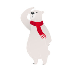 A polar white bear in a red scarf is standing on its hind legs.