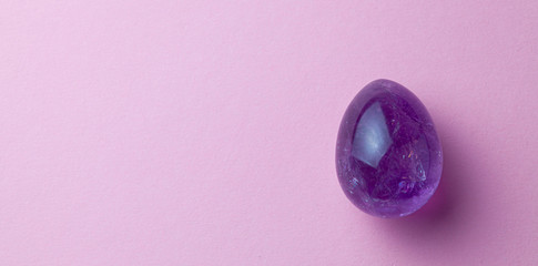 YONI EGG. The simulator of the female genital organs, vagina. Egg of stone. Copy space for text.