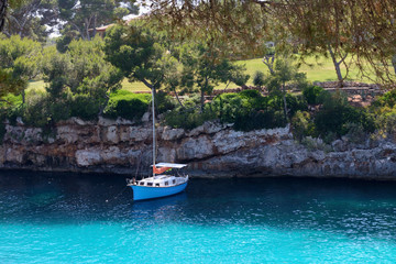 Naklejka na ściany i meble sail yacht in a beautiful sea lagoon