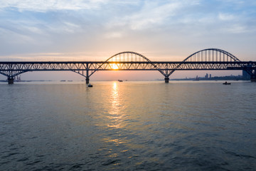 jiujiang yangtze river bridge in sunrise