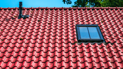Dutch orange roof with a window
