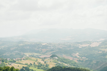 Obraz premium Beautiful view from San Marino city to hills of San Marino. Italian hills view from above