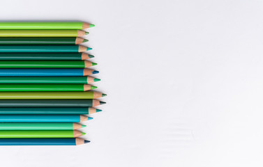Green color pencils isolated on white background