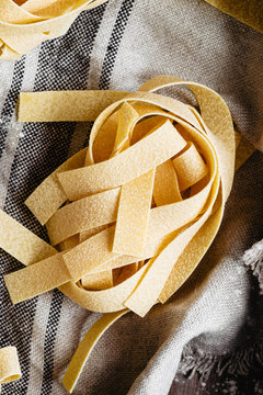 A nest of pasta on napkin