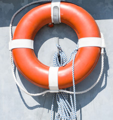 Red lifebuoy on a stand