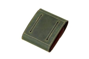 Leather wallet isolated on white background. Luxury leather wallet on a rivet button on a light back. Green leather wallet.