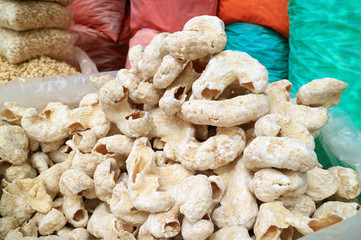 Pile of Bolivian Crispy Corn Snacks at the Local Market of Copacabana, Bolivia, South America