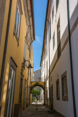 Fototapeta na wymiar Two Building, Gate and Narrow Alley, Braga, Portugal