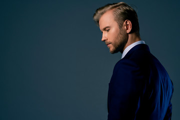 Obraz premium elegance caucasian Successful businessman with beard close up wear formal suit tie grey background