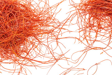 Lot of whole red chili pepper threads flatlay isolated on white background