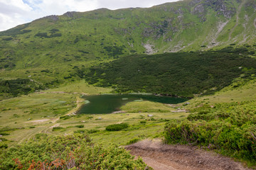 Mountain lake landscape from side of the mountain.