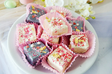 cookies with chocolate icing and sprinkles