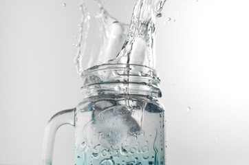  Flask with water splashing