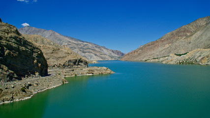 Erzurum, Tortum lake, cliff mountains and cloud reflection in water
