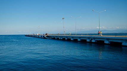 Sinop harbor, pier and strollers
