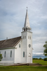 Fototapeta na wymiar Saint Antoine de Padoue Church located next to the Rectory in Batoche, saskatchewan