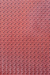 Corrugated metal surface with diamond plate texture. The diamond steel metal sheet.  Pattern of old metal diamond plate