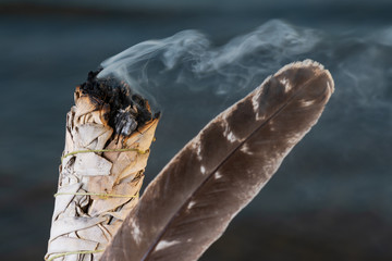 Smudging Ritual using burning thick leafy bundle of White Sage Grade A barred Turkey Smudging...