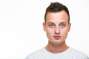 Obraz premium Portrait of a handsome young man on white background